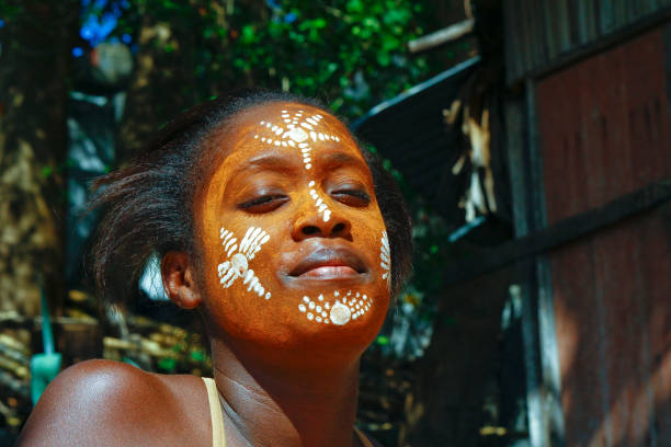 istock Woman with traditionally painted face, Madagascar 1126812108