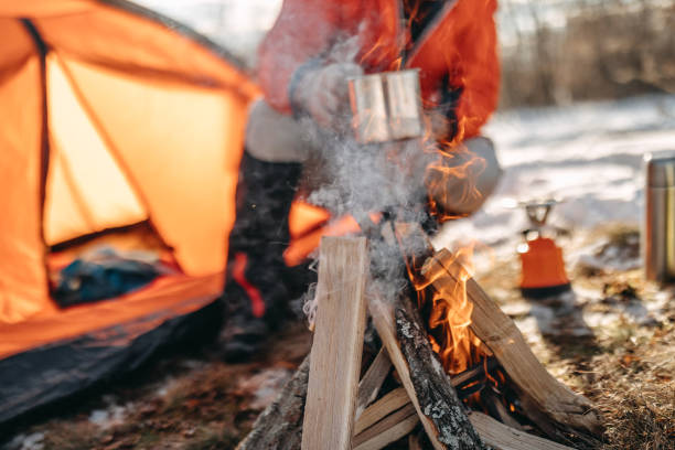 istock Man preparing food on mountain 1126814317