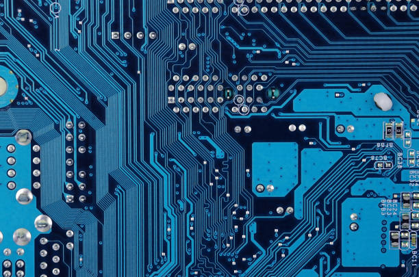 Circuit board background Close up of old printed blue computer circuit board byte photos stock pictures, royalty-free photos & images