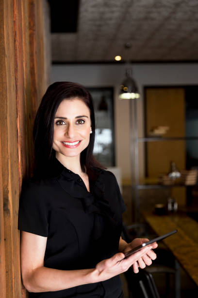 istock Happy businesswoman holding digital tablet 1126818576