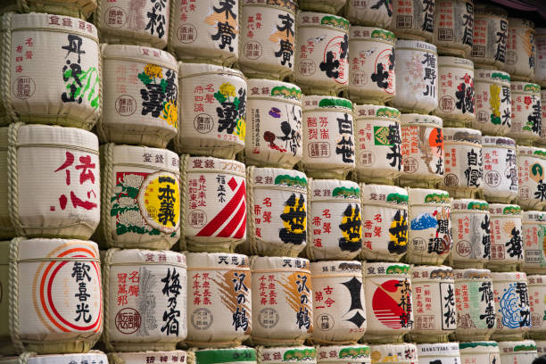 Large decorative wall of sake barrels at the famous Meiji-jingu Shrine in Tokyo Japan.
