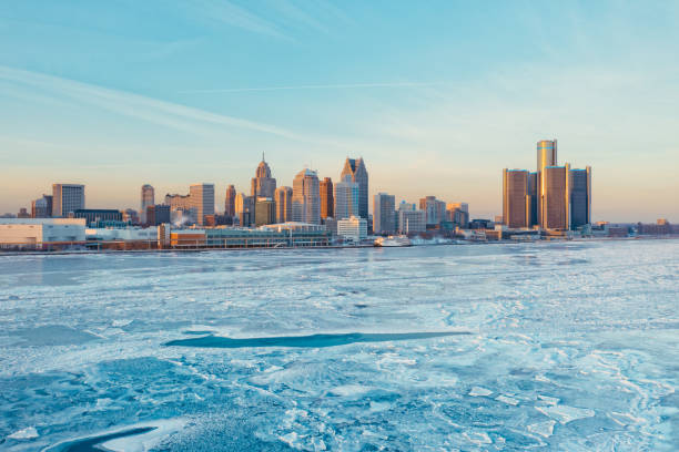 Detroit skyline with frozen river Detroit skyline with frozen river detroit michigan photos stock pictures, royalty-free photos & images