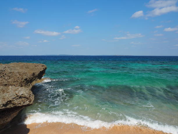 istock Waves lapping the sandy beach. Kudaka Island, Okinawa, Japan. 1126825840