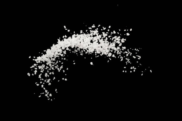 istock Salt splash explosion  isolated on black background , freeze stop motion 1126829980