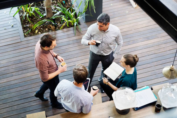 istock Business people discussing on floorboard in office 1126831354