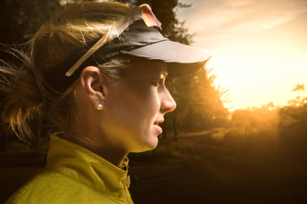 istock Fit woman looking away in forest 1126833179