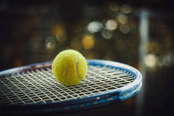 istock Tennis ball and racket 1126834578