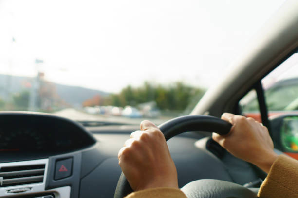 istock Driving Asian woman 1126834610