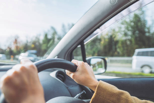 istock Driving Asian woman 1126834611