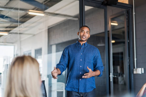 istock Confident businessman explaining plan to colleague 1126835583
