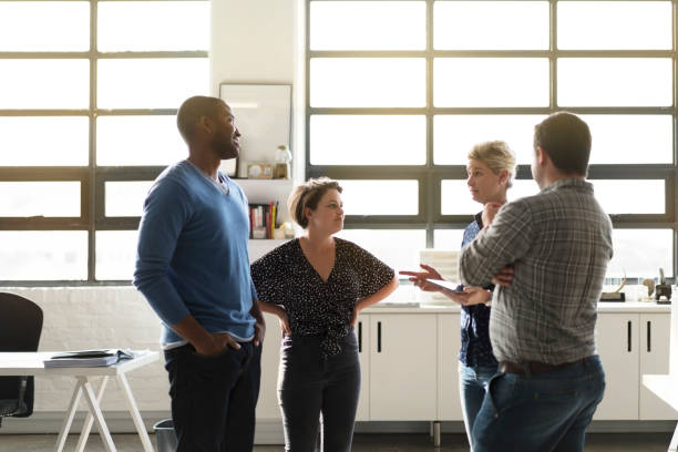 istock Business people discussing at workplace 1126836705