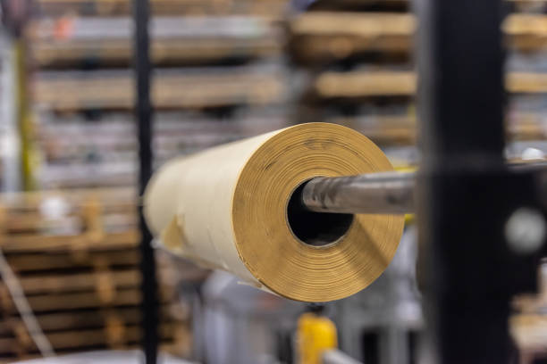 istock Roll of paper wrapping material in factory workshop packaging 1126838564