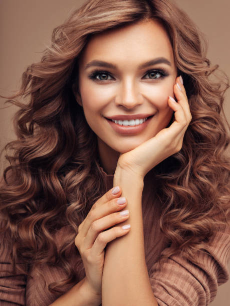 istock Brown haired woman with curly hairstyle 1126839372