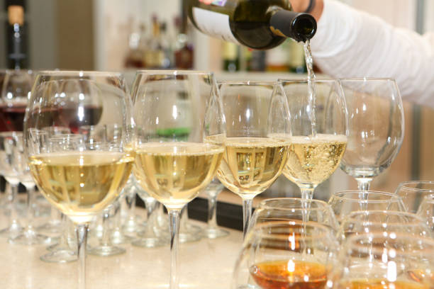 istock Glasses with champagne on the holiday table 1126839614