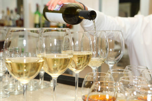 istock Glasses with champagne on the holiday table 1126839617