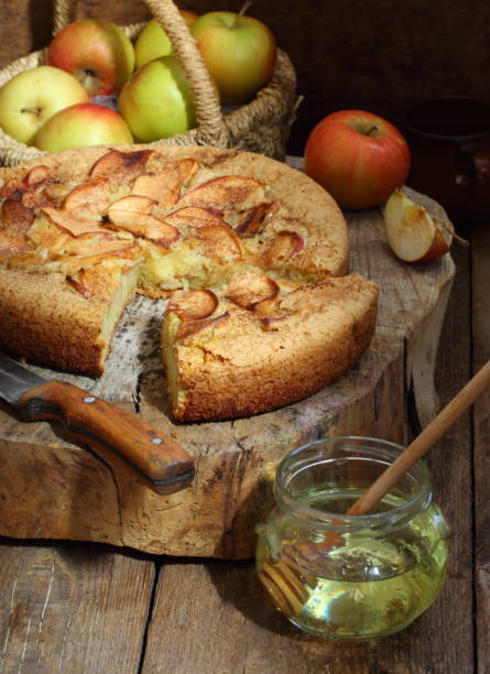 istock Still life with honey pie and honey pie on wooden table 1126839718