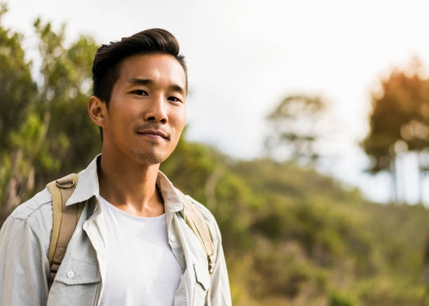istock Close-up portrait of confident male backpacker 1126840448