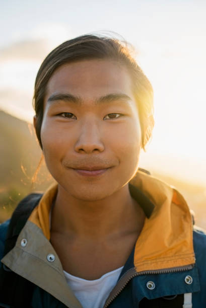 istock Portrait of smiling hiker during sunset 1126840653