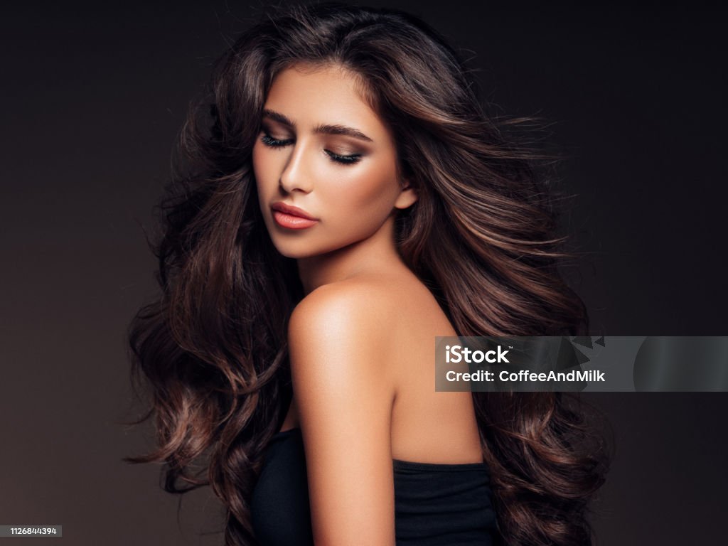 Brown Haired Woman With Curly Hairstyle Stock Photo - Download Image Now -  Hair, Fashion Model, Beauty - iStock