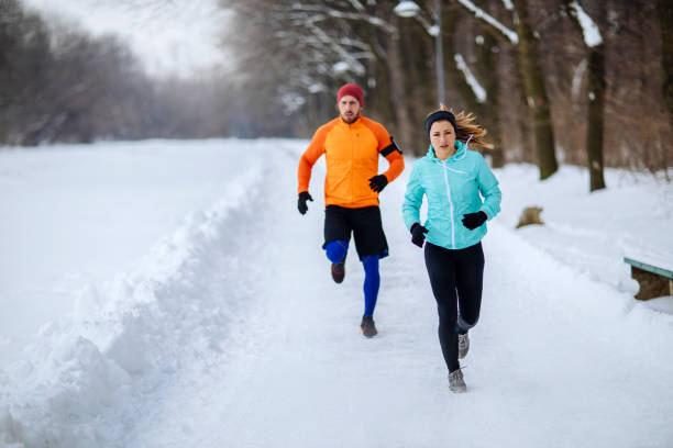 istock Snowy running day in the park 1126844867