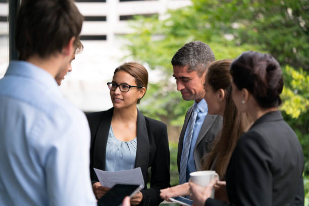 istock Confident business people discussing at balcony 1126844873