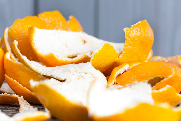 istock peel of peeled mandarins 1126847089