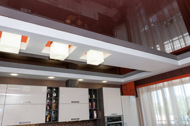 istock Square lamps on a suspended brown ceiling 1126849277
