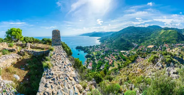 View of Cefalu and Promontorio de Torre Caldura seen from Norman Castle, La Rocca park, Sicily island, Italy