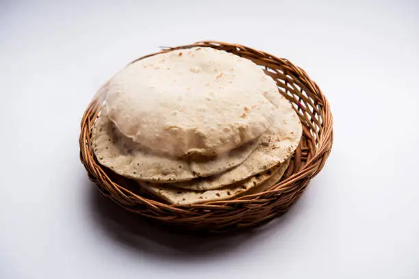 Chapati / Tava Roti also known as Indian bread or Fulka/phulka. Main ingredient of lunch/dinner in India/Pakistan. selective focus