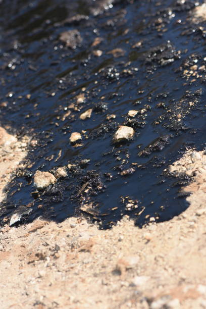istock Oil stain on the ground 1126849633