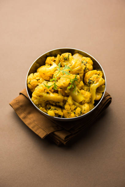 istock Dry Gobi Masala/ cauliflower Sabzi served in a bowl. selective focus 1126852101