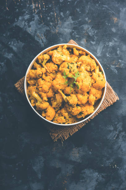 istock Dry Gobi Masala/ cauliflower Sabzi served in a bowl. selective focus 1126853129
