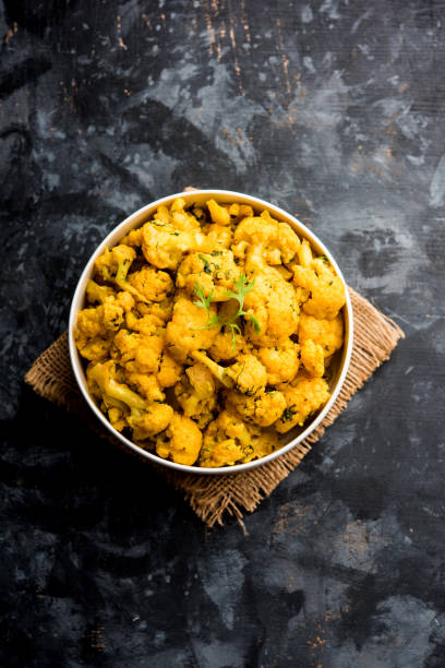 istock Dry Gobi Masala/ cauliflower Sabzi served in a bowl. selective focus 1126853155