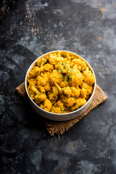 istock Dry Gobi Masala/ cauliflower Sabzi served in a bowl. selective focus 1126853281