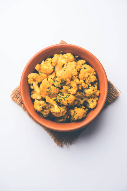 istock Dry Gobi Masala/ cauliflower Sabzi served in a bowl. selective focus 1126853621