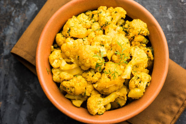 istock Dry Gobi Masala/ cauliflower Sabzi served in a bowl. selective focus 1126855325