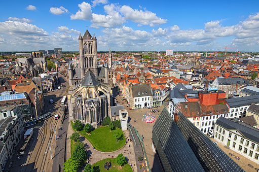 An enchanting image of Ghent, Belgium, showcasing the city's historic charm with its well-preserved medieval architecture, picturesque canals, and quaint cobblestone streets. This vibrant city is a blend of rich history and modern culture, making it a captivating destination in the heart of Europe.
