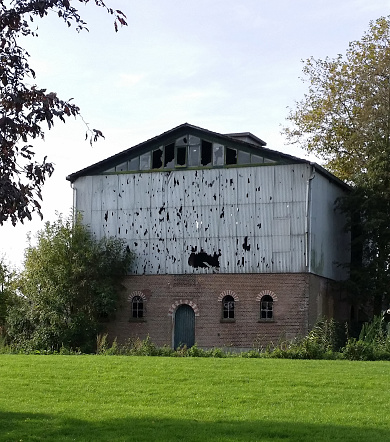 Old grain silo along the ring canal Zuidplaspolder in Zevenhuizen waiting for redevelopment in the Netherlands