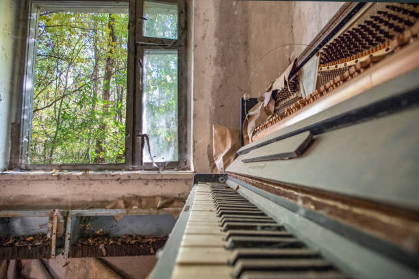 istock thrown a piano in an abandoned apartment in Pripyat 1126859807
