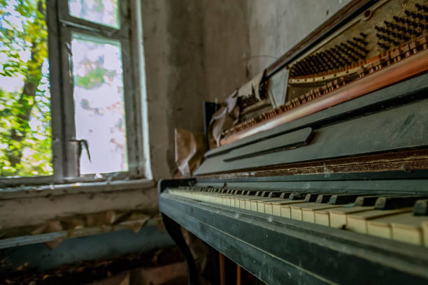 istock thrown a piano in an abandoned apartment in Pripyat 1126859813