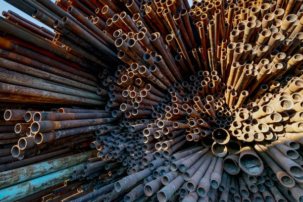 istock bunch of rust pipes is made one by one 1126861426