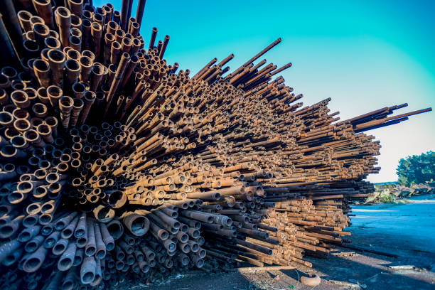 istock bunch of rust pipes is made one by one 1126861428