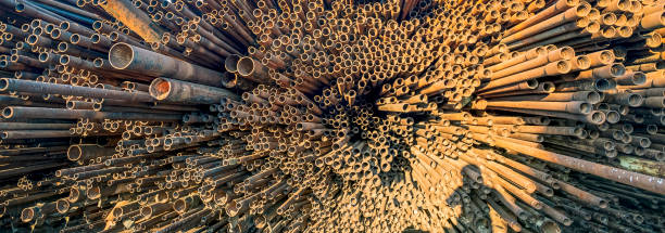 istock bunch of rust pipes is made one by one 1126861445