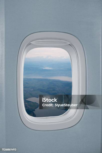 A R Plane Window Airplane Window With Landscape Stock Photo - Download Image Now ...