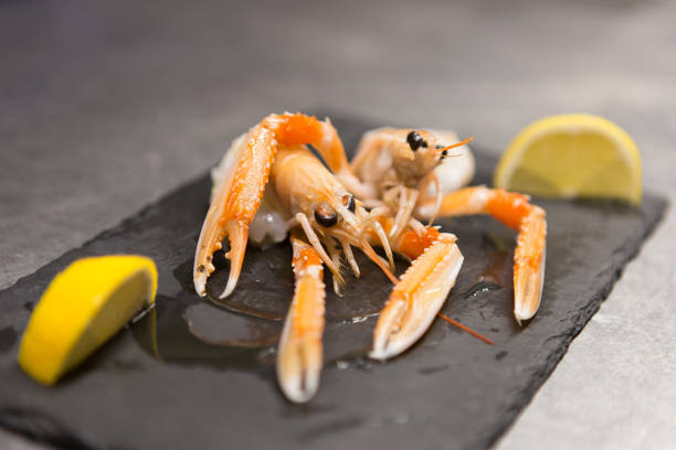 istock Prawns served with oil and lemon 1126863230