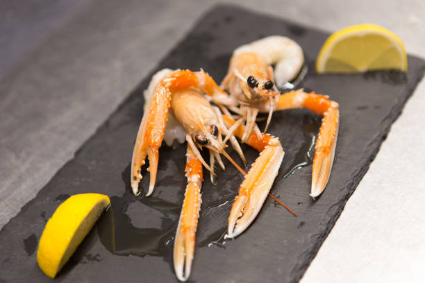 istock Prawns served with oil and lemon 1126863238