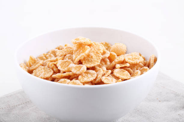 istock Muesli with milk and apple on a white background 1126866496