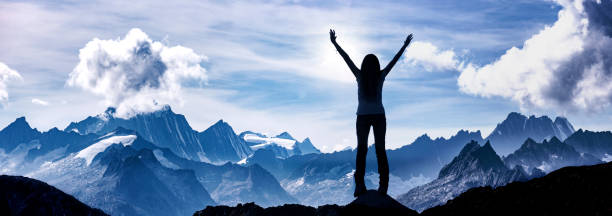 istock woman hiking in alps 1126867249