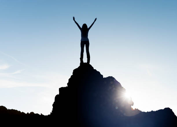 istock Woman at  Rock summit 1126867260
