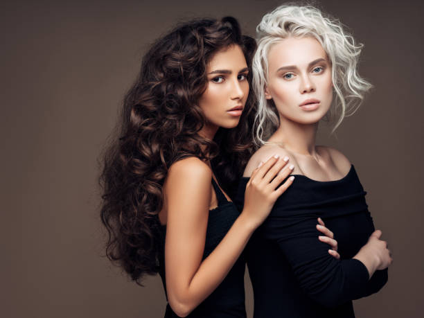 istock Two beautiful girls with make-up 1126871146